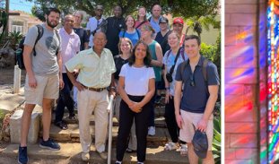 A group of Trinity parishioners smile for a and outdoor photo in South Africa under clear blue skies and surrounded by greenery. A red and purple detail from a stained glass window shines in another photo on the right-hand side to fill out the frame. 