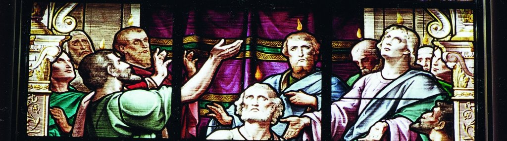 Stained glass depicting Pentecost